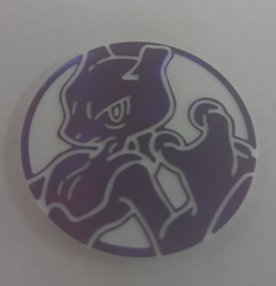 OFFICIAL POKEMON MEWTWO TOKEN FLIPPING COIN PLASTIC - PURPLE AND WHITE - Image 1