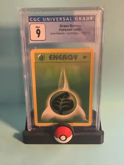 Graded POKEMON GRASS ENERGY 1ST EDITION 129/132 - OLD BLUE CGC 9 - Image 1