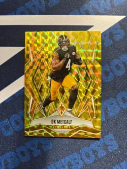 2025 Panini Phoenix - DK Metcalf #4 Yellow Pyramids SN 153/185 - Image 1