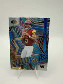 2024 Panini Illusions - Shining Stars Jayden Daniels #3 (RC) - Image 1