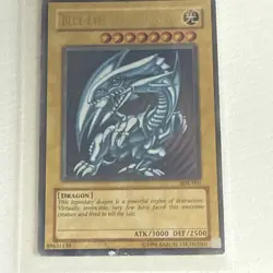 Yugioh Blue-Eyes White Dragon SDK-001 Ultra Rare Unlimited HP Heavy Holo Bleed - Image 1