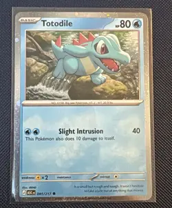 Totodile (Cosmos Holo) 041/217 NM Pokemon Card - Image 1