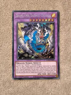 Snake-Eyes Doomed Dragon (1st, Secret) - SUDA-EN035 - YuGiOh Card - Image 1