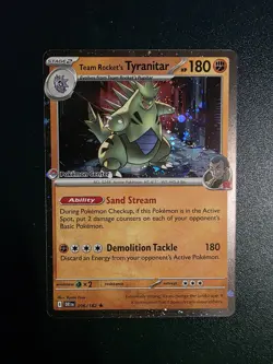 Team Rocket’s Tyranitar 096/182 Promo Pokemon TCG Card Center Stamp Sealed - Image 1