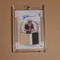 2025 Panini National Treasures Tyler Shough Rookie Patch Autograph /25 Saints - Image 1