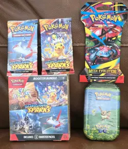 Pokemon TCG Lot of 5: Surging Booster Bundle + 2 Packs, 1 Mega Evo Slv, 1 Go TIN - Image 1