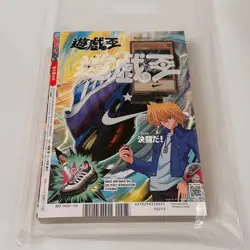 Yugioh Red-Eyes Black Dragon Nike Worlds Promo NKC1-EN002 card and the magazine - Image 1