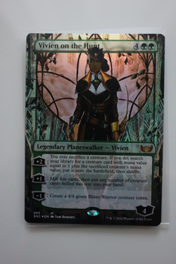 Vivien on the Hunt from Streets of New Capenna Borderless FOIL MTG - Image 2