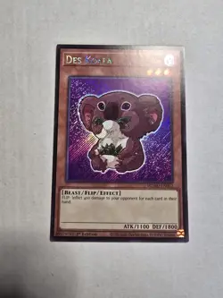 Yugioh! 1x Des Koala MZMU-EN062 Secret Rare 1st Ed NM - Image 1