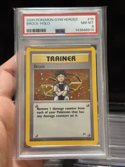 2000 POKEMON GYM HEROES #15 BROCK-HOLO PSA 8 - Image 1
