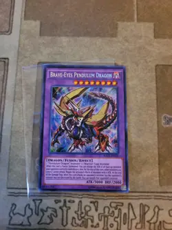 YUGIOH BRAVE-EYES PENDULUM DRAGON RATE-EN039 SECRET UNLIMITED ED NM - Image 2