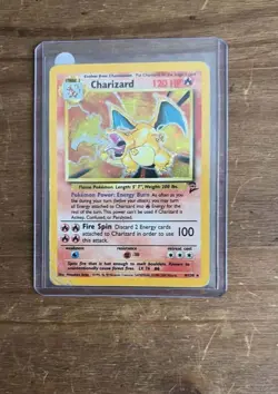 Pokemon Base Set 2 Charizard Rare Holo Card #4/130 (Damaged) - Image 1