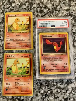 3 Vntg Pokemon Charmander, incl One 1st Edition PSA graded NM Mint, 1 Japanese - Image 1