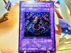 Thousand Eyes Restrict secret rare yu-gi-oh trading card singles - Image 1