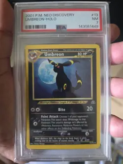 PSA 7 UMBREON 13/75 | Neo Discovery WOTC Holo Pokemon Card - Image 1