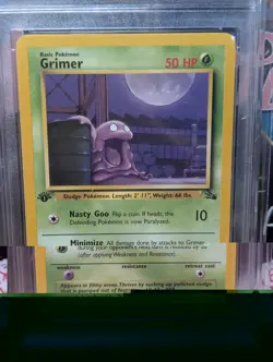 Grimer 1st Edition 48/62 Fossil 1999 Pokemon Card - GetGraded 8 Near Mint - Image 3