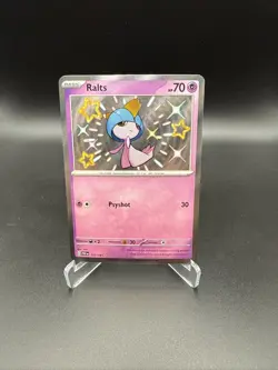 Pokemon Ralts 153/091 SV: Paldean Fates Holo (NM) - Image 1