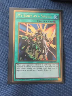 YUGIOH MY BODY AS A SHIELD GOLD RARE PGL2-EN074 1ST EDITION - Image 1