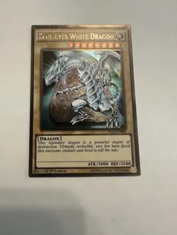 Yugioh Blue-Eyes White Dragon 1st Edition Gold Ultra Rare PGL2-EN080 NM - Image 1