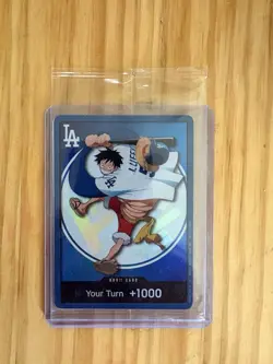 2026 Dodgers x One Piece Night Promo Card Monkey D Luffy In hand - Image 1