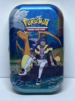 Pokemon Charizard and Leon mini Tin With Art Work Card, Sticker And Coin Only - Image 1
