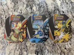 Pokemon TCG | Eevee Eeveelution Tins | Flareon Jolteon Vaporeon | Set of 3 - Image 1