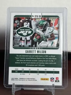 Panini 2022 Chronicles Studio Garrett Wilson Jets STU-38 Pink /199 RC Insert - Image 2