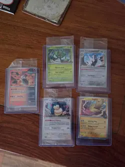 EB Games Promo Card Bundle: Iron Moth, Ogrepon, Arcualudon, Hop's Snorlax, etc. - Image 1