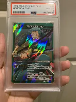 PSA 8 2012 MIRACLE BATTLE CARDDASS ONE PIECE OP12 RORONOA ZORO 16 - Image 1