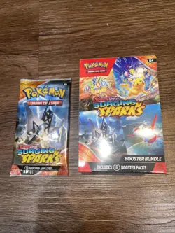 Pokemon SURGING SPARKS BOOSTER BUNDLE 7 Packs - Image 1
