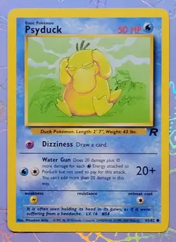 Psyduck 65/82 Team Rocket Pokemon Card NM - Image 1