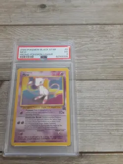 Graded PSA 3 2000 POKEMON BLACK STAR MEW PROMO POKEMON LEAGUE - Image 1