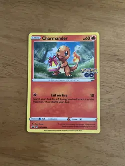 Pokemon TCG Charmander SWSH232 Black Star Promo Pokemon GO - Image 1