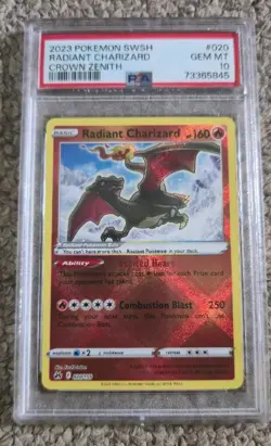 2023 POKEMON SWORD & SHIELD CROWN ZENITH #020 RADIANT CHARIZARD PSA 10 - Image 1