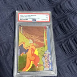 1999 TOPPS POKEMON THE MOVIE EDT TRAPPED CHARIZARD-FOIL #51 MOVIE EDITION PSA 7 - Image 1