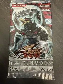 Yugioh 2010 The Shining Darkness Booster Pack 1st Edition Factory Sealed! - Image 1