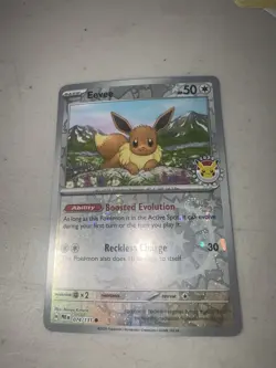 Eevee - 074/131 (Pokemon Day 2025) (Reverse Cosmos Holo) Prismatic Evolution - Image 1