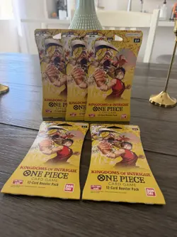 One Piece TCG Kingdoms Of Intrigue 12-Card Booster Pack - Image 1