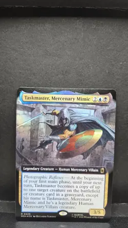 MTG Taskmaster, Mercenary Mimic (Extended Art) Marvel Super Heroes Foil - Image 1