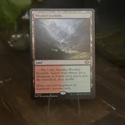 NM MTG Wooded Foothills #236 Regular Rare Land - Modern Horizons 3 EN - Image 1