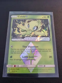 Pokemon PRISM STAR Card Celebi 19/214 Sun & Moon Lost Thunder TCG - Image 1