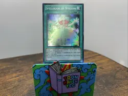 Spellbook of Wisdom Super Rare Astral Pack 4 AP04-EN010 - Image 1