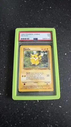 Pikachu 1999 Jungle PSA 7 60/64 NM WOTC Pokemon Card - Image 1