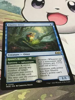 C4985 MAGIC MTG WILDS OF ELDRAINE ELUSIVE OTTER #0225 RARE NM - Image 2