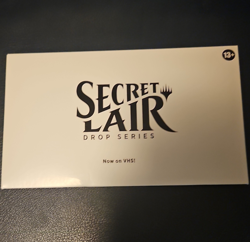 MTG Magic The Gathering Secret Lair Now On VHS! Sealed - Image 1