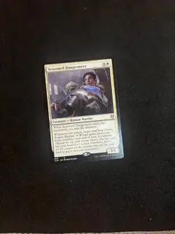 Seasoned Dungeoneer [Baldur's Gate] Near Mint MTG Magic the Gathering Cards - Image 1