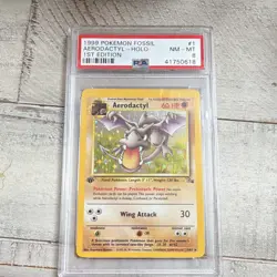 Pokemon TCG Aerodactyl Fossil 1st Edition Holo #1/62 PSA 8 (1999) - Image 1