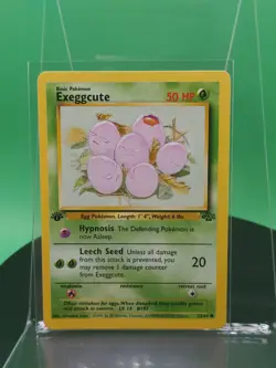 Exeggcute 52/64 1st Edition Jungle Set Common 1999 English Pokemon Card WoTC - Image 1