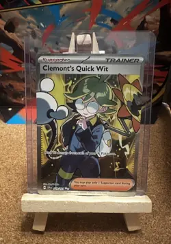 Surging Sparks 229/191 Clemont's Quick Wit SV08 Full Art Trainer Pokemon Card NM - Image 1