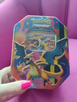 Pokemon TCG: Mega Charizard Tin - Y New & Sealed **slight dent in tin** - Image 1